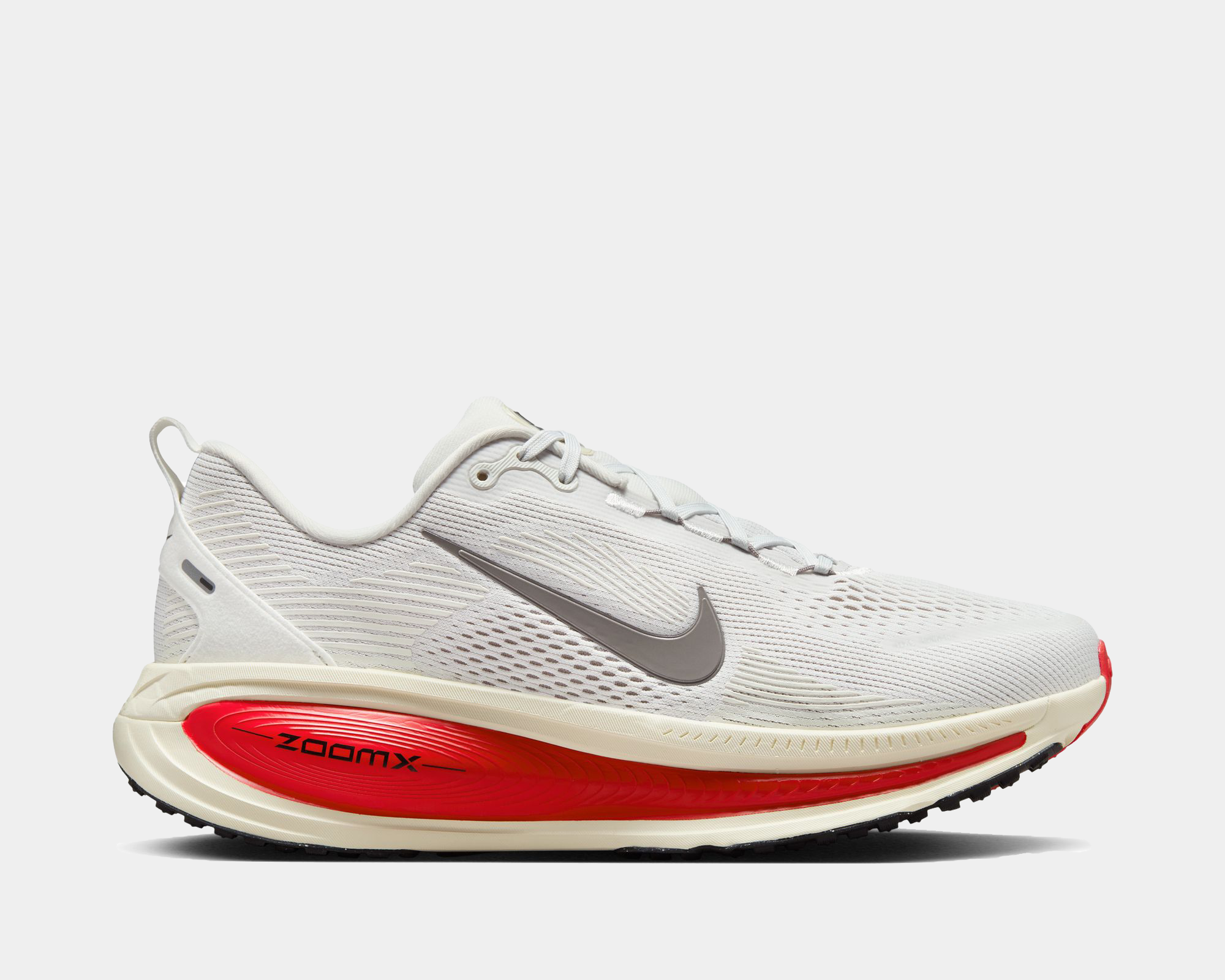 White running shoe with red sole and Nike logo on a light gray background