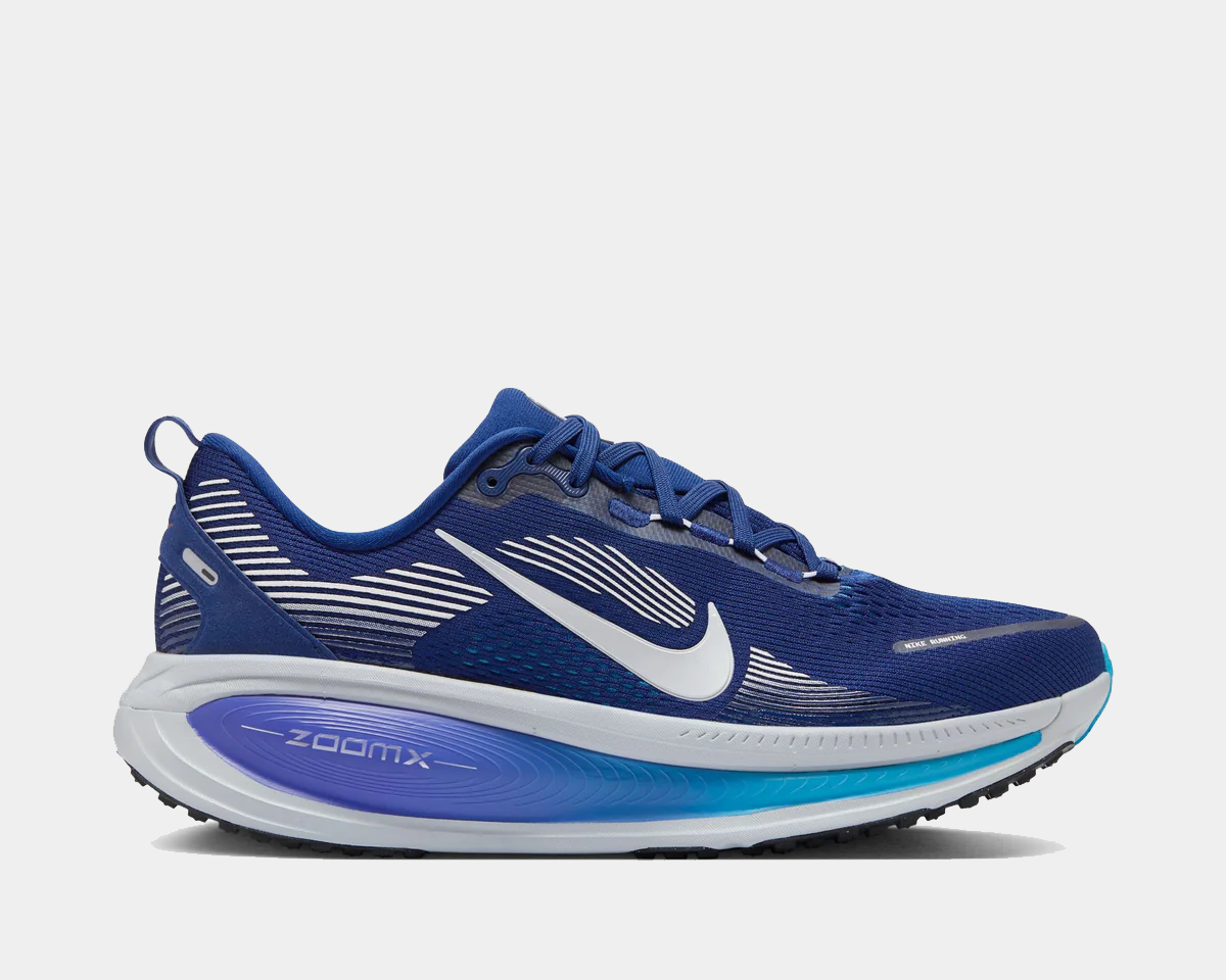 Blue running shoe with white swoosh logo on a light gray background