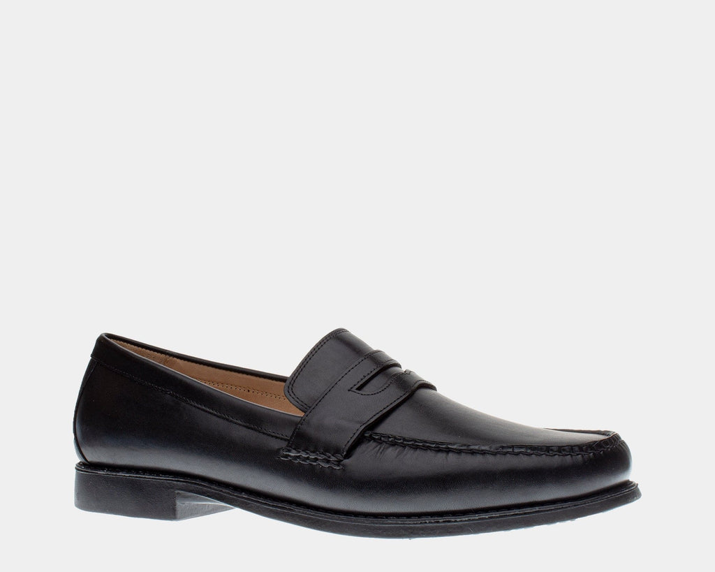 A black full-grain leather penny loafer with a slip-on construction and sheepskin lining.