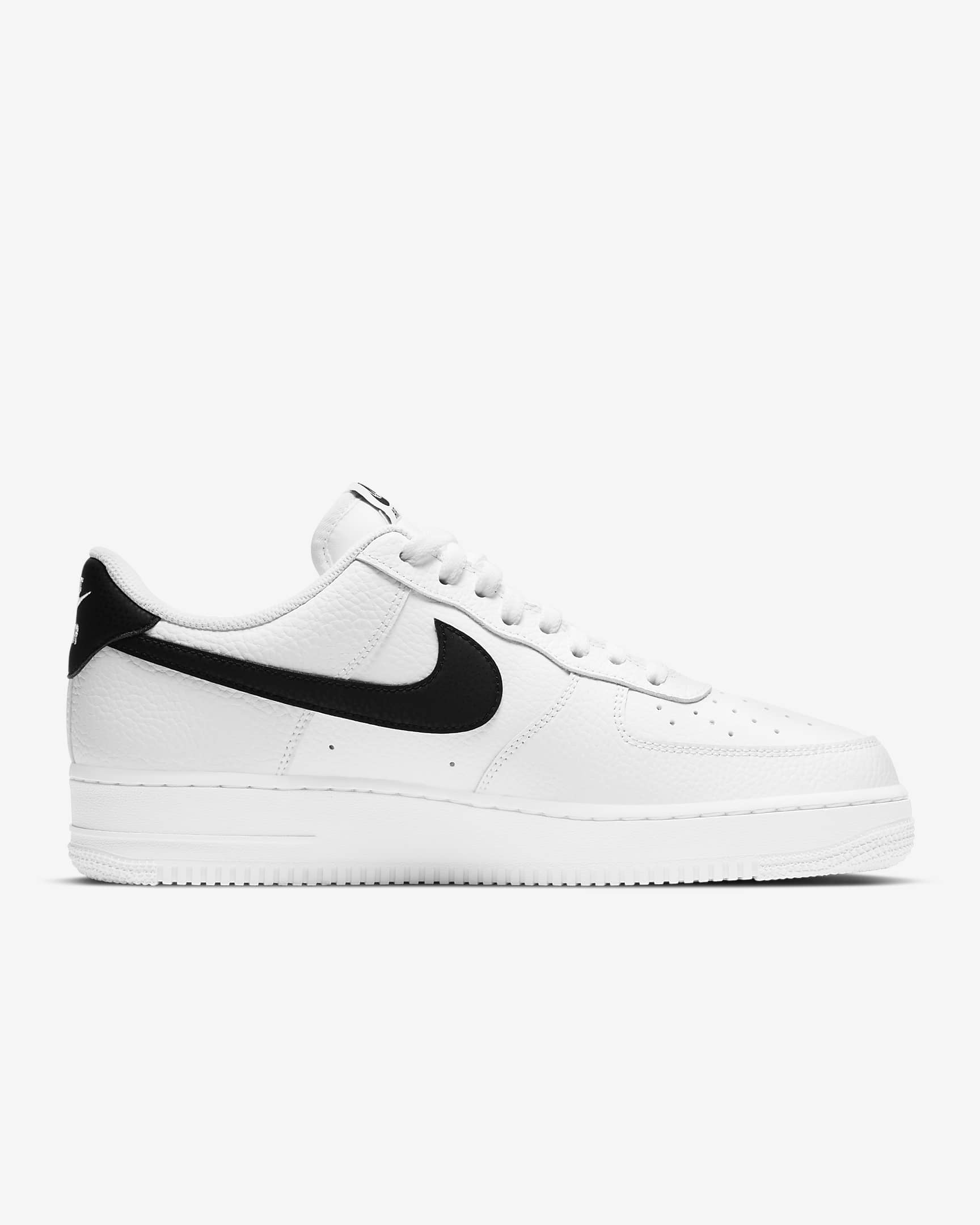 A pair of white Nike Air Force 1 '07 sneakers with a black swoosh and lace-up closure.