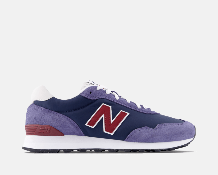 Navy and blue sneaker with red 'N' logo on a white background