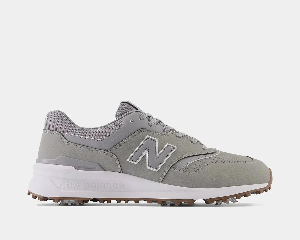 A pair of New Balance 997 golf shoes in gray and white with a waterproof microfiber leather upper and FastTwist 3.0 removable Pulsar cleats.